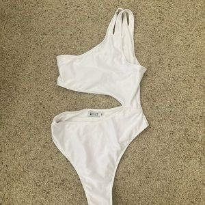 Slit open white bodysuit bathing suit